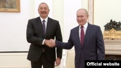 İlham Əliyev və Vladimir Putin. Arxiv fotosu